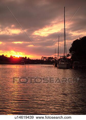 Stock Photo -  Palm Coast, FL, Florida, intracoastal waterway, sunset. Fotosearch
