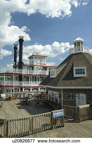 Stock Photo -  Peoria, IL, Illinois, Illinois River, Riverfront, Paddle Wheeler, Spirit of Peoria, riverboat. Fotosearch