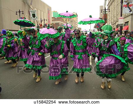 Philadelphia, PA, Pennsylvania, downtown, New Years Day, Philadelphia Annual Mummer's Day Parade, 2006, Comic Division, men and boys in purple and green dresses strutting with umbrellas, Froggy Carr View Large Photo Image Picture - Philadelphia, PA, Pennsylvania, downtown, New Years Day, Philadelphia Annual Mummer's Day Parade, 2006, Comic Division, men and boys in purple and green dresses strutting with umbrellas, Froggy Carr. Fotosearch