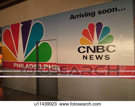 Stock Image -  Philadelphia, PA, Pennsylvania, Philadelphia International Airport, airport terminal, NBC News advertisement. Fotosearch