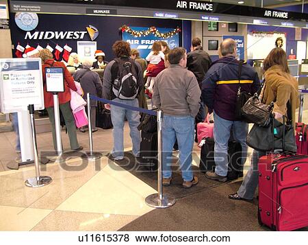 Stock Photo -  Philadelphia, PA, Pennsylvania, Philadelphia International Airport, check-in, airport terminal, people waiting in line. Fotosearch
