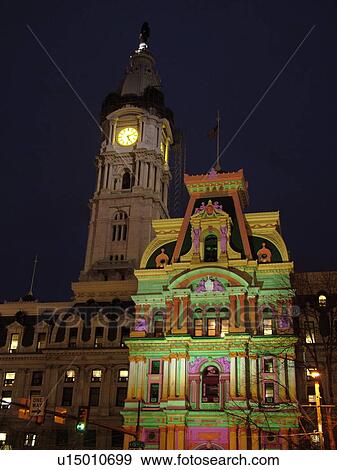 Stock Photo -  Philadelphia, PA, Pennsylvania, downtown, evening, City Hall, colorful lights on building. Fotosearch