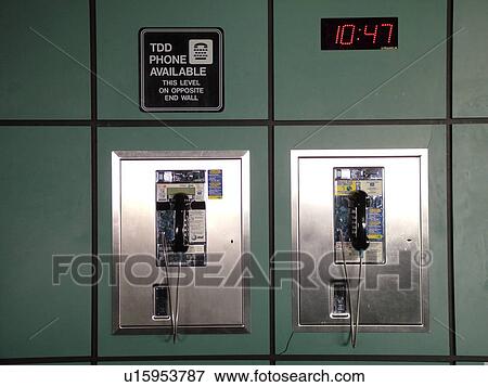 Philadelphia, PA, Pennsylvania, Philadelphia International Airport, telephones, airport terminal, pay phones, digital clock on wall View Large Photo Image Stock Photo - Philadelphia, PA, Pennsylvania, Philadelphia International Airport, telephones, airport terminal, pay phones, digital clock on wall. Fotosearch