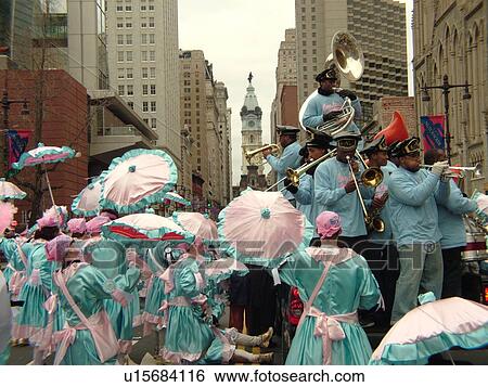 Philadelphia, PA, Pennsylvania, downtown, New Years Day, Philadelphia Annual Mummer's Day Parade, 2006, Royal Brass Band, comic division, men in blue and pink dresses with umbrellas View Large Photo Image Stock Photograph - Philadelphia, PA, Pennsylvania, downtown, New Years Day, Philadelphia Annual Mummer's Day Parade, 2006, Royal Brass Band, comic division, men in blue and pink dresses with umbrellas. Fotosearch