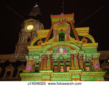 Stock Photography -  Philadelphia, PA, Pennsylvania, downtown, evening, City Hall, colorful lights on building. Fotosearch