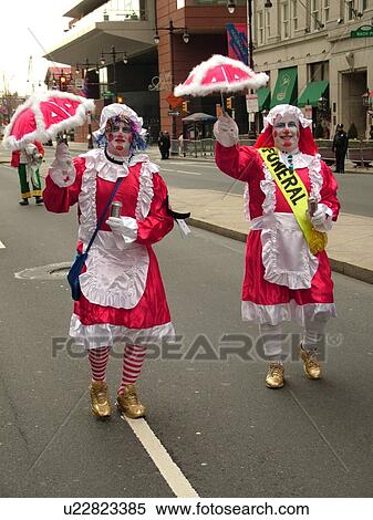 Philadelphia, PA, Pennsylvania, downtown, New Years Day, Philadelphia Annual Mummer's Day Parade, 2006, Comic Division, men in red and white dresses with umbrellas View Large Photo Image Stock Photography - Philadelphia, PA, Pennsylvania, downtown, New Years Day, Philadelphia Annual Mummer's Day Parade, 2006, Comic Division, men in red and white dresses with umbrellas. Fotosearch