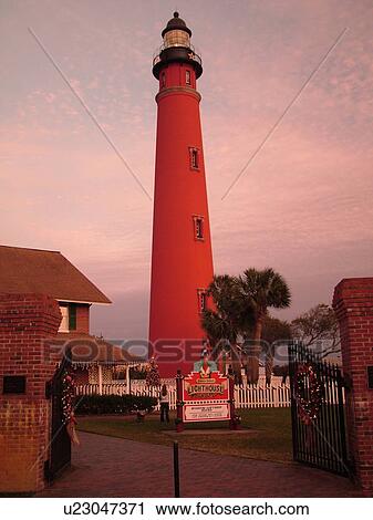 Stock Image -  Ponce Inlet, Daytona Beach, FL, Florida, Atlantic Ocean, Ponce De Leon Inlet Light Station, lighthouse, museum, sunset. Fotosearch