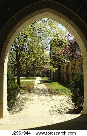 Stock Image -  Princeton, NJ, New Jersey, Princeton University, Madison Hall, Holder Courtyard, archway . Fotosearch
