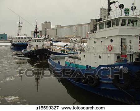 Quebec City, Quebec, Canada, Saint Lawrence River, Fleuve St-Laurent, Vieux Port, tug boats, winter, ice View Large Photo Image Stock Photo - Quebec City, Quebec, Canada, Saint Lawrence River, Fleuve St-Laurent, Vieux Port, tug boats, winter, ice. Fotosearch