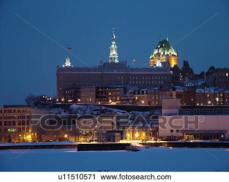 Stock Image -  Quebec City, Quebec, Canada, Vieux Port (Old Port), St. Lawrence River (Fleuve Saint-Laurent), downtown, skyline, evening. Fotosearch