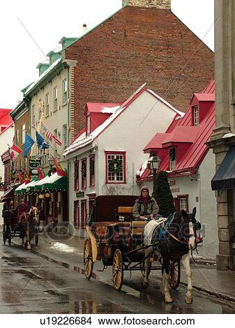 Picture -  Quebec City, Quebec, Canada, Winter Carnival 2006, Rue St. Louis, horse drawn carriages, historic district. Fotosearch