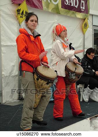 Quebec City, Quebec, Canada, Winter Carnival 2006, Place Desjardens, two girls drumming View Large Photo Image Stock Image - Quebec City, Quebec, Canada, Winter Carnival 2006, Place Desjardens, two girls drumming. Fotosearch