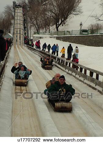 Stock Image -  Quebec City, Quebec, Canada, Winter Carnival 2006, Toboggan Run at Terrasse Dufferin (Dufferin Terrace) in Vieux Quebec (Old Quebec).. Fotosearch