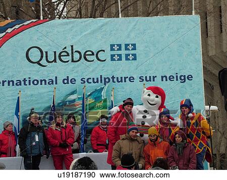 Stock Image -  Quebec City, Quebec, Canada, Winter Carnival 2006, Bonhomme the carnival mascot, Award ceremony for the snow sculpture competition. Fotosearch