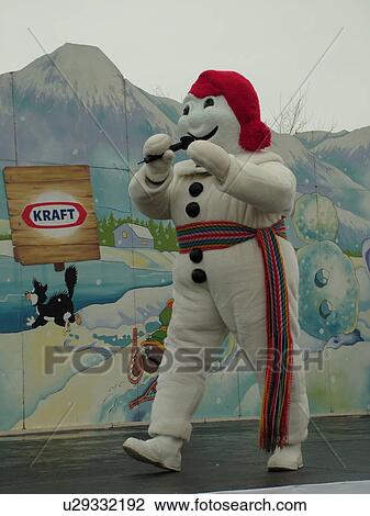 Stock Image -  Quebec City, Quebec, Canada, Winter Carnival 2006, Place Desjardens, mascot, Bonhomme performing on stage. Fotosearch