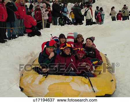 Quebec City, Quebec, Canada, Winter Carnival 2006, Place Desjardins, people sliding down the hill in rubber float, snow View Large Photo Image Stock Photo -  Quebec City, Quebec, Canada, Winter Carnival 2006, Place Desjardins, people sliding down the hill in rubber float, snow. Fotosearch