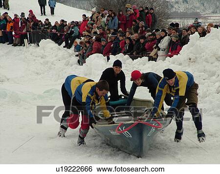 Stock Photograph -  Quebec City, Quebec, Canada, Winter Carnival 2006, Place Desjardins, Canoe Race, snow. Fotosearch