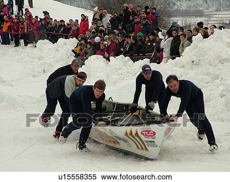Stock Photography -  Quebec City, Quebec, Canada, Winter Carnival 2006, Place Desjardins, Canoe Race, snow. Fotosearch
