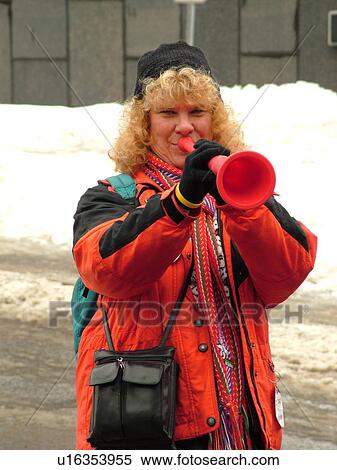 Quebec City, Quebec, Canada, Winter Carnival 2006, Go-Kart Races, woman blowing red horn View Large Photo Image Stock Photography - Quebec City, Quebec, Canada, Winter Carnival 2006, Go-Kart Races, woman blowing red horn. Fotosearch