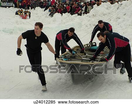 Stock Photography -  Quebec City, Quebec, Canada, Winter Carnival 2006, Place Desjardins, Canoe Race, snow. Fotosearch