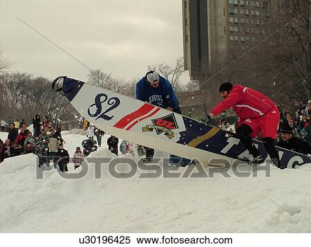Stock Photography -  Quebec City, Quebec, Canada, Winter Carnival 2006, Place Desjardins, Canoe Race, snow. Fotosearch