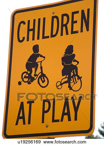 Stock Photo -  road sign, Children At Play, warning sign, . Fotosearch