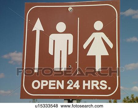 Stock Photo -  road signs, Public restrooms, open 24 hours, Rest Area. Fotosearch