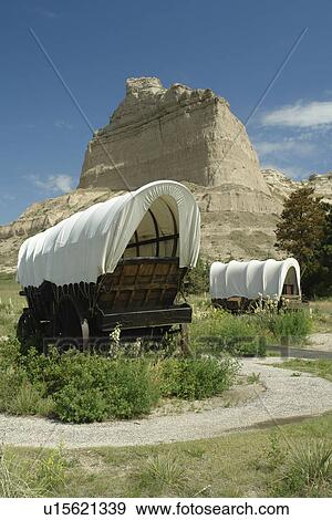 Stock Photo -  Scotts Bluff National Monument, NE, Nebraska, covered wagons. Fotosearch