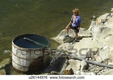 Stock Photograph -  Stanley, ID, Idaho, Sawtooth National Recreation Area, Sawtooth National Forest, Sawtooth Valley, Salmon River, natural hot spring. Fotosearch