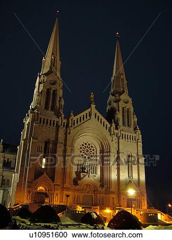 Stock Image -  Ste Anne de Beaupre, Quebec City, Quebec, Canada, Basilique de Ste-Anne-de-Beaupre, Basilica of Ste-Anne-de-Beaupre, evening. Fotosearch