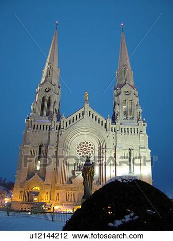 Stock Image -  Ste Anne de Beaupre, Quebec City, Quebec, Canada, Basilique de Ste-Anne-de-Beaupre, Basilica of Ste-Anne-de-Beaupre, evening. Fotosearch