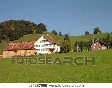 Stock Photograph -  Switzerland, Europe, Appenzell, typical Appenzell farmhouse and barn combined. Fotosearch