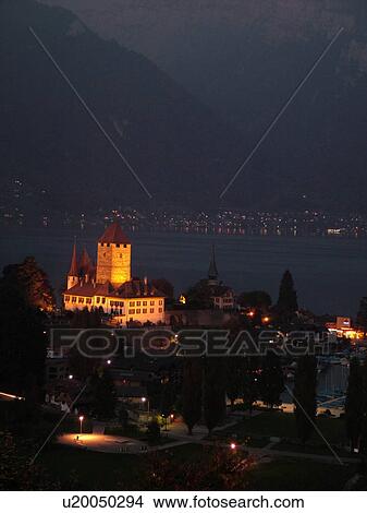 Picture -  Switzerland, Europe, Bern, Berne, Spiez, Bernese Alps, Berner Oberland, Lake Thun, Thuner See, castle, evening. Fotosearch