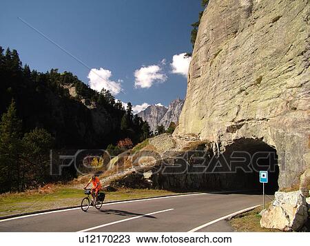 Stock Image -  Switzerland, Europe, Bern, Berne, Sustenpass, Susten Pass, Berner Oberland, mountain road, tunnel, biking. Fotosearch