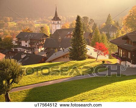 Stock Image -  Switzerland, Europe, Bern, Berne, Grindelwald, Bernese Alps, Berner Oberland, village, autumn. Fotosearch