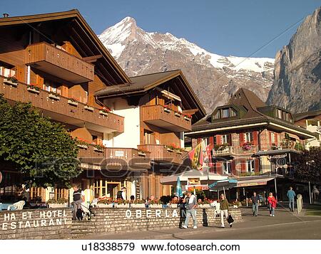 Switzerland, Europe, Bern, Berne, Grindelwald, Bernese Alps, Berner Oberland, chalets, hotels, outdoor cafTs View Large Photo Image Stock Photo - Switzerland, Europe, Bern, Berne, Grindelwald, Bernese Alps, Berner Oberland, chalets, hotels, outdoor cafTs. Fotosearch