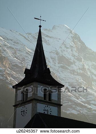 Stock Photo -  Switzerland, Europe, Bern, Berne, Grindelwald, Bernese Alps, Berner Oberland, Eiger, church. Fotosearch