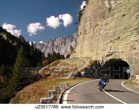 Stock Photograph -  Switzerland, Europe, Bern, Berne, Sustenpass, Susten Pass, Berner Oberland, mountain road, tunnel, motorcycle. Fotosearch