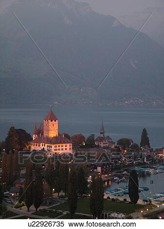Stock Photography -  Switzerland, Europe, Bern, Berne, Spiez, Bernese Alps, Berner Oberland, Lake Thun, Thuner See, castle, evening. Fotosearch