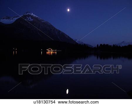 Switzerland, Europe, Lenzereide, Valbella, Heidsee, Graubunden, Grisons, moonrise, mountain lake, reflection, evening View Large Photo Image Picture - Switzerland, Europe, Lenzereide, Valbella, Heidsee, Graubunden, Grisons, moonrise, mountain lake, reflection, evening. Fotosearch