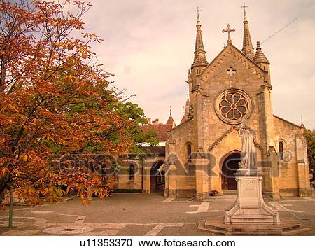 Stock Image -  Switzerland, Europe, Neuchatel, La Collegiale, Romanesque-Gothic 12th century church. Fotosearch