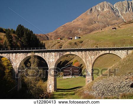 Switzerland, Europe, Sedrun, Graubunden, Grisons, railroad bridge, train View Large Photo Image Stock Image - Switzerland, Europe, Sedrun, Graubunden, Grisons, railroad bridge, train. Fotosearch