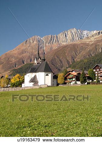 Stock Photo -  Switzerland, Europe, Sedrun, Graubunden, Grisons, church. Fotosearch
