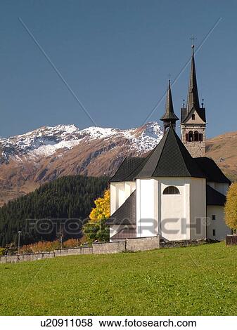 Stock Photo -  Switzerland, Europe, Sedrun, Graubunden, Grisons, church. Fotosearch