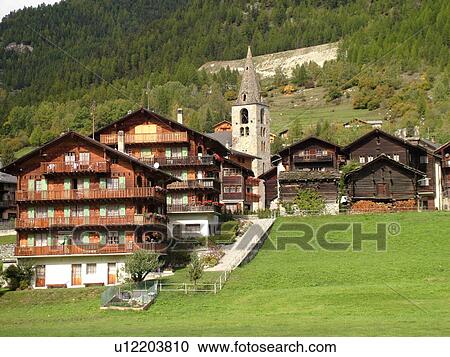 Switzerland, Europe, valais, wallis, Val D'Herens, Evolene, village, chalets, church View Large Photo Image Stock Image - Switzerland, Europe, valais, wallis, Val D'Herens, Evolene, village, chalets, church. Fotosearch