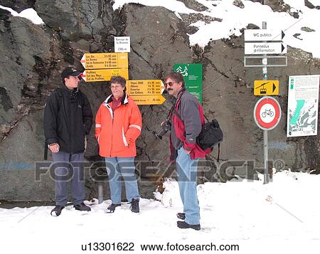 Stock Image -  Switzerland, Europe, valais, wallis, Val D'Heremence, Dam Grande Dixence, people, informative signs. Fotosearch