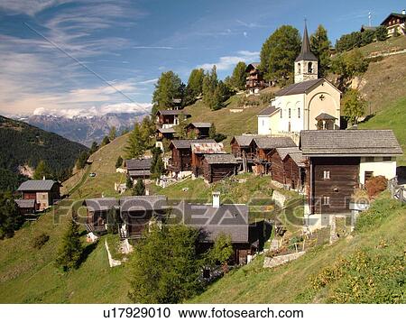 Switzerland, Europe, valais, wallis, Val d'Anniviers, Chandolin, alpine village, chalets, church, mountainside View Large Photo Image Stock Image - Switzerland, Europe, valais, wallis, Val d'Anniviers, Chandolin, alpine village, chalets, church, mountainside. Fotosearch