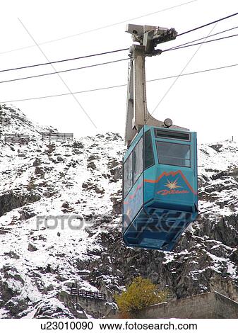 Stock Image -  Switzerland, Europe, valais, wallis, Val D'Heremence, Dam Grande Dixence, 2, 365 metres, world's highest concrete dam, blue cable car. Fotosearch