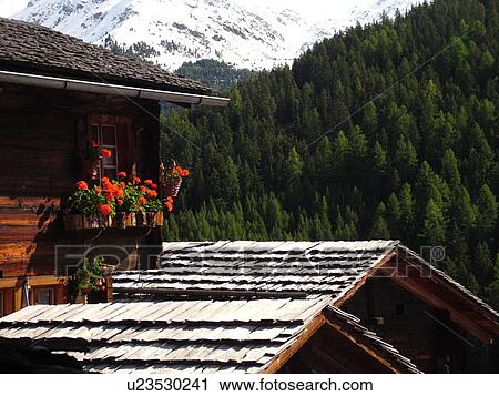 Switzerland, Europe, valais, wallis, Val d'Anniviers, Grimentz, alpine village, rooftops, flowers in window box View Large Photo Image Stock Image - Switzerland, Europe, valais, wallis, Val d'Anniviers, Grimentz, alpine village, rooftops, flowers in window box. Fotosearch