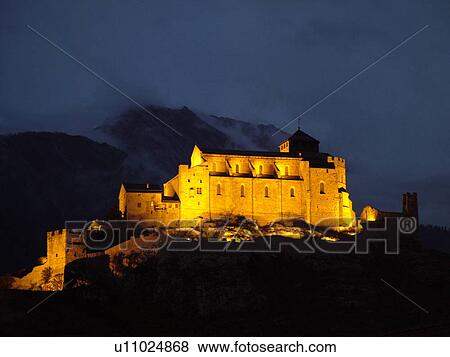 Switzerland, Europe, valais, wallis, Sion, Rhone Valley, Fendant Wine Region, Church of Notre Dame de ValFre, 11th century, illuminated, evening, alps View Large Photo Image Stock Photo - Switzerland, Europe, valais, wallis, Sion, Rhone Valley, Fendant Wine Region, Church of Notre Dame de ValFre, 11th century, illuminated, evening, alps. Fotosearch